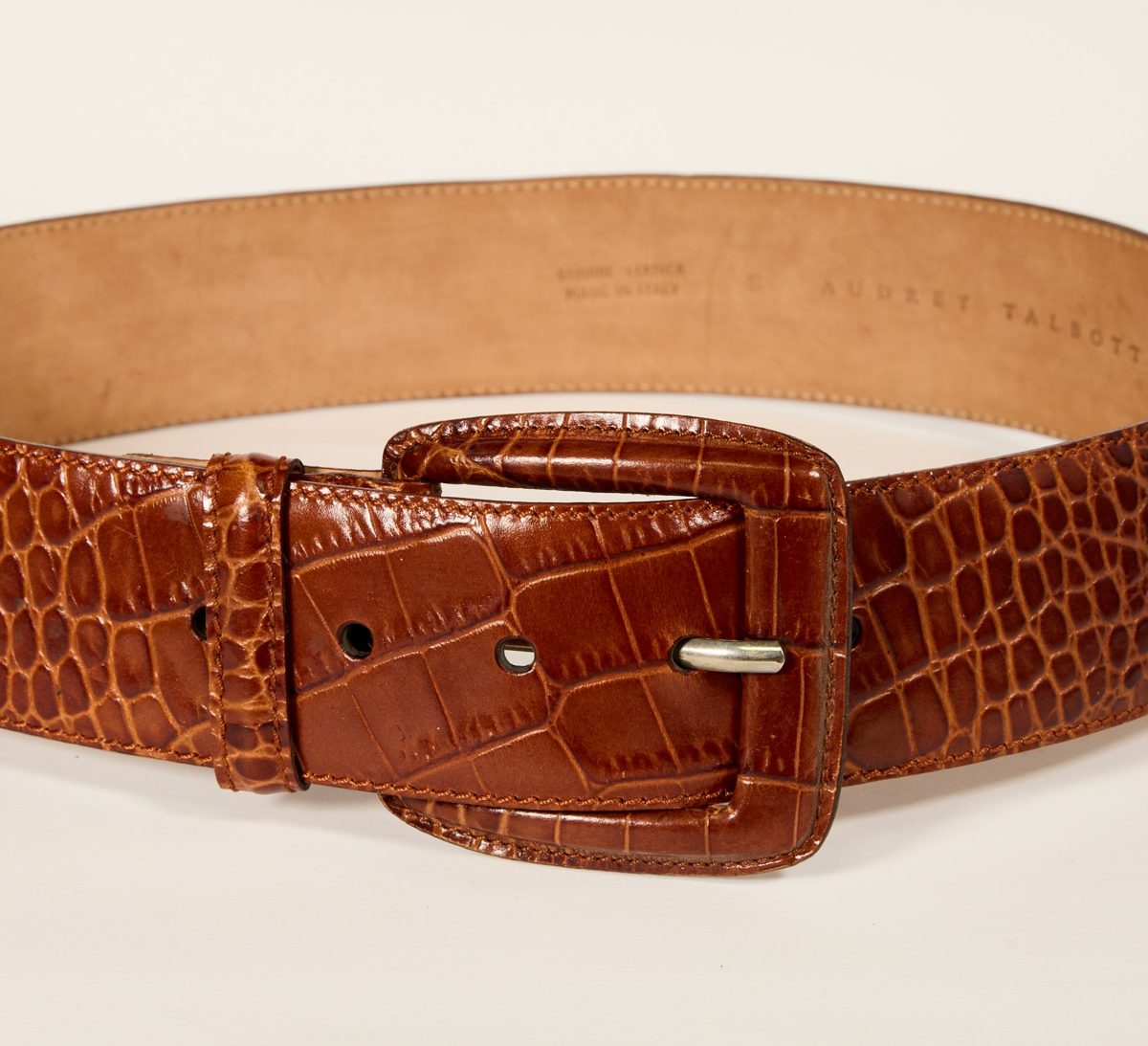 Wide belt in crocodile-print leather